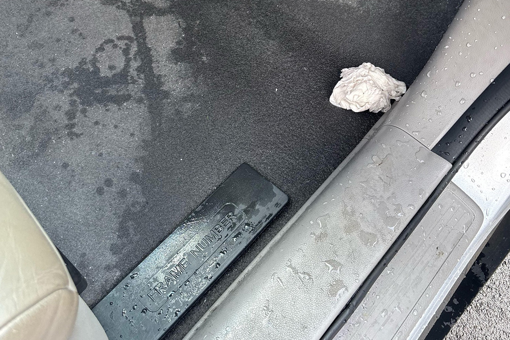 car water leak floor wet carpet 2
